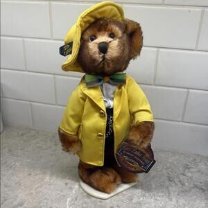 Pickford Bear Ltd. Mookie Brass Button Bear w yellow rain coat, hat. New w stand